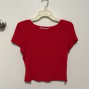 a red short sleeve shirt